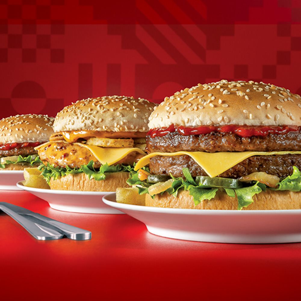 Assortment of Wimpy burgers displayed on a restaurant table